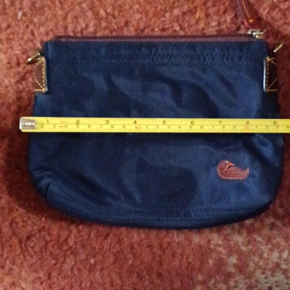 Dooney and bourke clutch purse FIRM